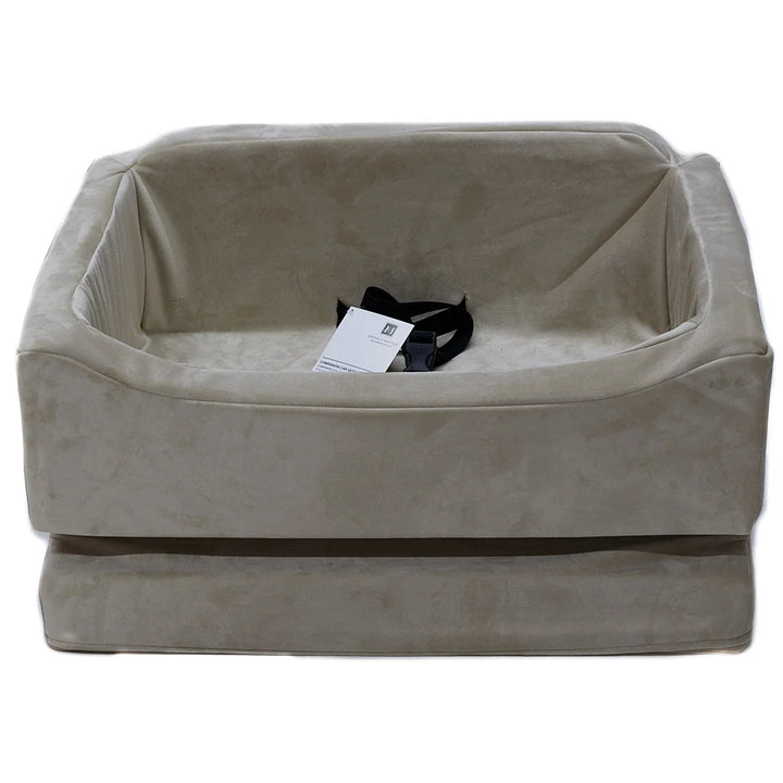 Animals Matter Companion Car Seat - Camel luxury dog car seat on a white studio background, featuring a plush camel travel seat with black safety straps.