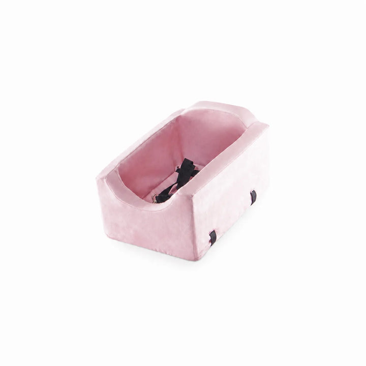 Animals Matter Companion Car Seat Console dog car seat console in pink, showing an angled product view of the padded seat with black safety straps on a white background.
