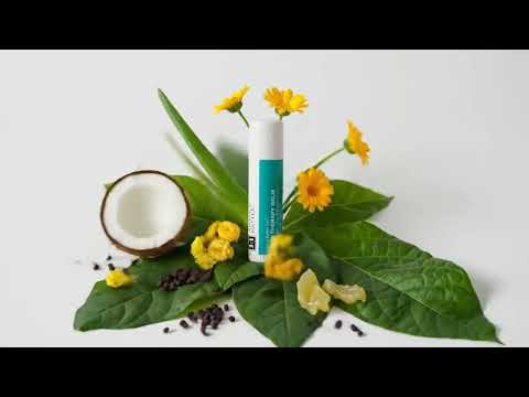 A visual of our paw balm surrounded by the raw natural organic ingredients that its made out of, cohesively surrounding the paw balm  